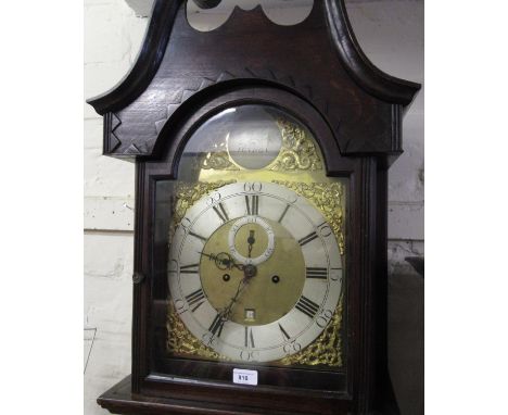 George III oak longcase clock, the broken arch hood above shaped panel door and plinth base, the gilt and silvered dial with 