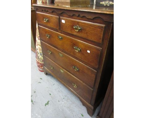 18th Century oak chest, the moulded top above a shallow moulded frieze, the two upper drawers with concealed locking mechanis