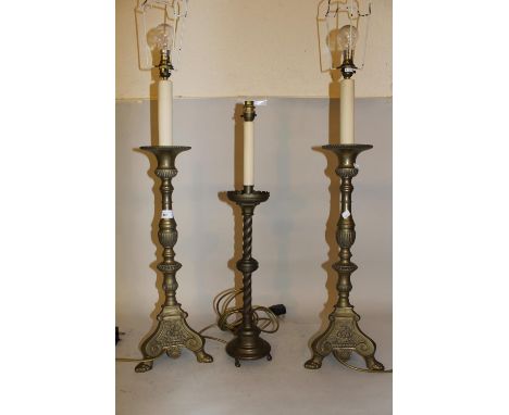 Pair of brass table lamps in 17th Century Dutch style, 23.5ins high excluding fitments, together with a similar ecclesiastica