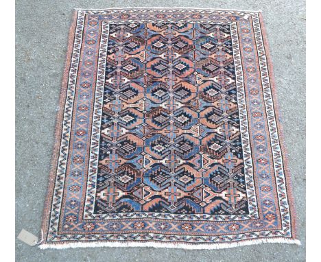 Small Kurdish mat with a repeating serrated leaf centre panel with dark ground and triple border, 3ft 8ins x 3ft approximatel