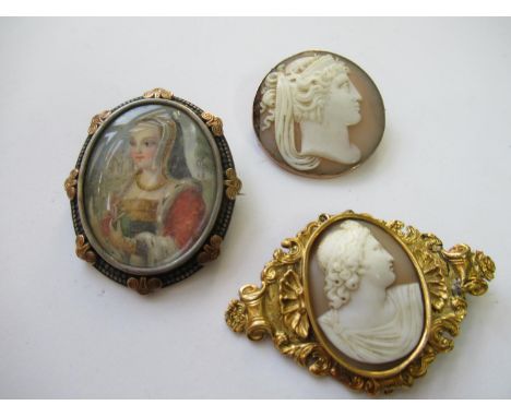 19th Century oval carved shell cameo portrait brooch in an ornate gold mount, together with a circular cameo portrait brooch 