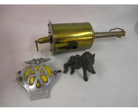 Automobile Association chromium and yellow enamel car badge together with a brass clock work spit jack and a patinated metal 