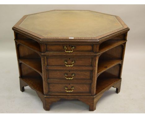 Good quality octagonal oak partners desk, circa 1930, the leather inset moulded top above an arrangement of various drawers a