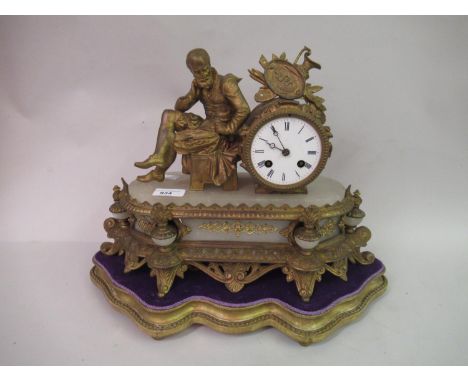 19th Century French gilded spelter and alabaster mantel clock surmounted by a seated figure of a man wearing 16th Century cos