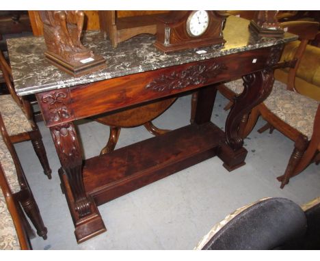 Good quality mahogany console table in Regency style, the flecked marble top above a floral decorated frieze with single draw