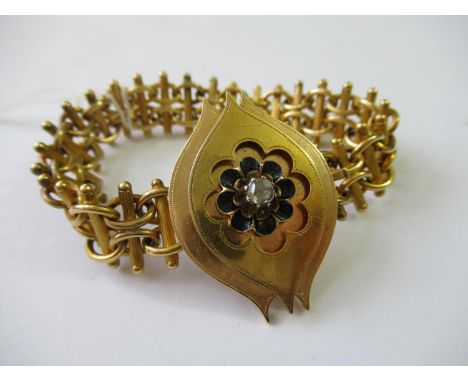 Continental gold bracelet, the enamel decorated clasp set with a rose cut diamond25g 