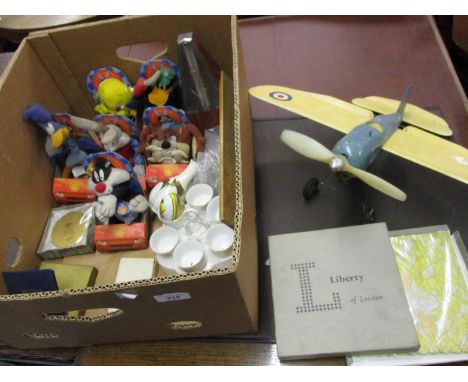 Painted composite scale model of an R.A.F. aircraft together with a quantity of Shell Looney Tunes figures in original carton