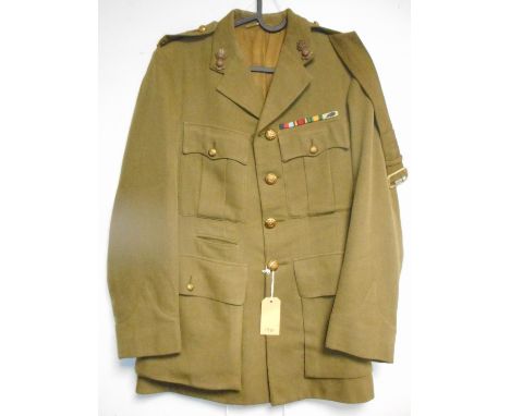 British Army dress uniform khaki green jacket with interior pocket label "S9409 R Ogilvie" having Royal Engineers brass butto