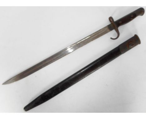 British 1907 pattern bayonet with Mk. I sheath, a rare example existing with the hooked quillion Condition report:Marks:Crown