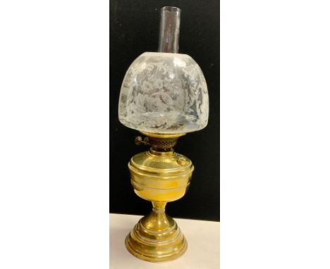 A victorian brass oil lamp with twin duplex burner 