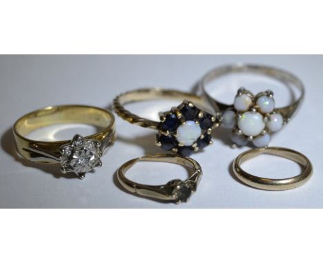 Jewellery - an 18ct gold diamond accented cluster ring, 3.3g; a 9ct gold cluster ring and 2 others, smaller, 3.8g gross; a 92