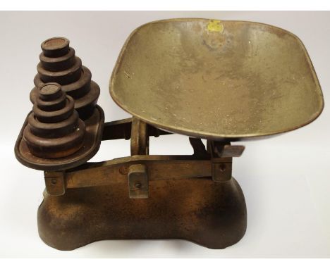 A late 19th century cast iron balance shop scale, J &amp; J Whitehouse and other weights 
