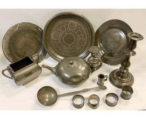 Pewterware - a pushup candlestick, plates, condiment spirit measure, teapot, sugar tray, napkin rings and ladle, some contine