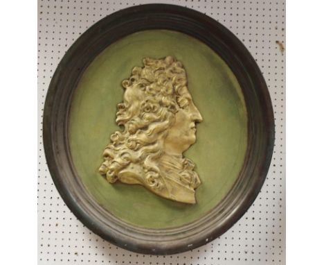 A 19th century portrait relief, of George II, in gilt on a green ground, integrated frame, 66cm diam 