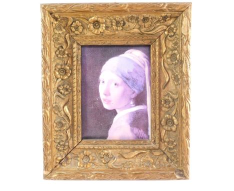 After Vermeer.  The Girl With A Pearl Earring, print on canvas, within a ornate floral gilt frame, 19cm x 14cm. 
