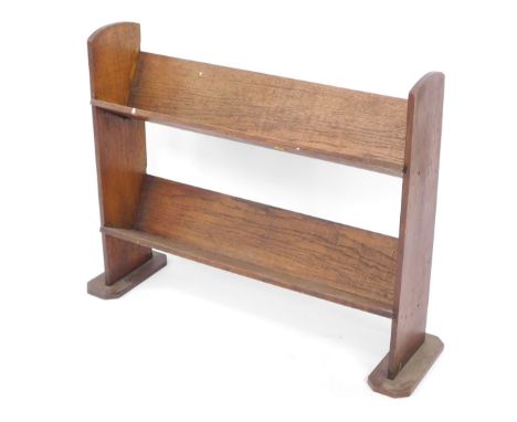 A Victorian Arts &amp; Crafts style two tier book trough, 62cm high, 83cm wide, 25cm deep. 