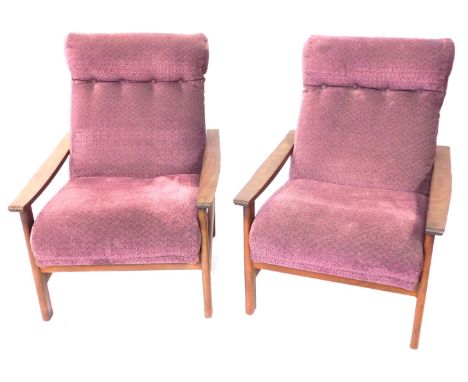 A pair of vintage teak lounge chairs, each chair upholstered in a purple ribbed fabric with four button back detailing, 100cm