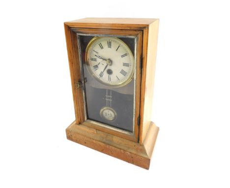 A late 19thC mahogany cased mantel clock, the circular enamelled metal dial bearing Roman numerals, thirty hour movement, the