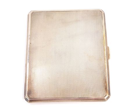 A George V silver cigarette case, rectangular with engine turned detailing and canted corners, Mappin &amp; Webb, Birmingham 