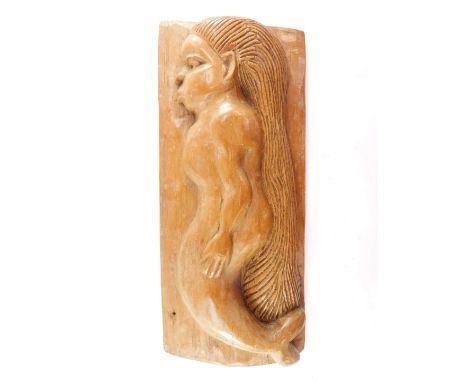 Folk Art. A carved wooden panel of a mermaid, 50cm x 22cm. 
