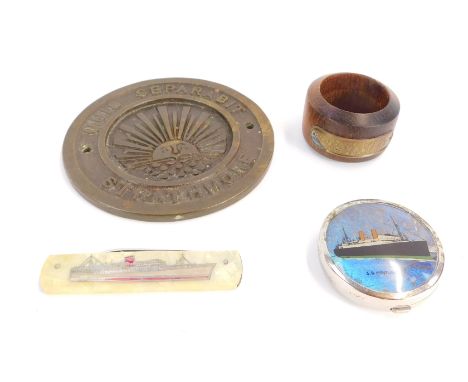 Naval interest. A mother of pearl Stirling Castle pen knife, a wooden napkin ring from the teak of HMS Valiant, Jutland 1916,