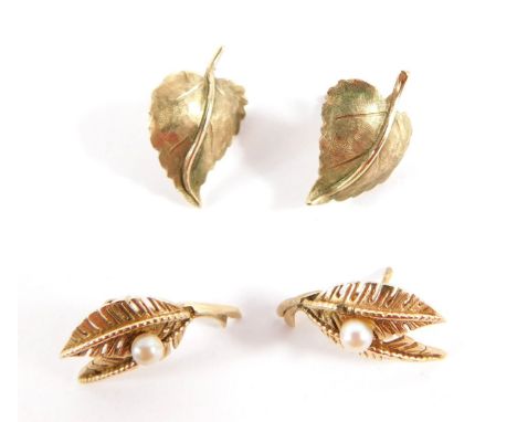 Two pairs of 9ct gold leaf earrings, comprising a pair of two leaf fern earrings with cultured pearl centre, and a pair of MK