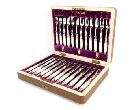 A plated fruit canteen of cutlery, twelve place settings, cake knives and forks with mother of pearl handles, in a Colonial c
