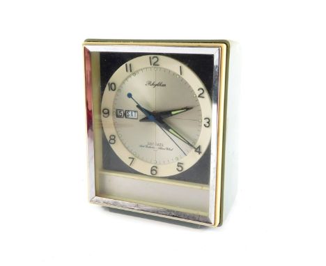 A mid-Century Japanese Rhythm mantel clock, of rectangular form, with silvered dial bearing Arabic numerals, centre seconds a