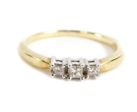 A 9ct gold diamond trilogy ring, with three ascher cut diamonds totalling approx 0.15cts, in four claw setting, ring size N, 