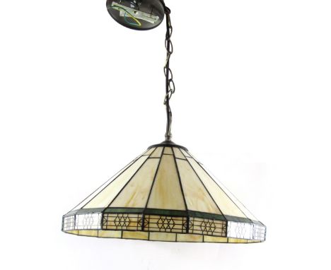 A Tiffany style ceiling light, the domed top with cream panels and green outer borders, 38cm diameter. 