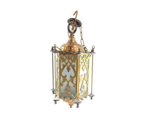 A Victorian Gothic brass and frosted glass hall lantern, of octagonal form, with engraved tracery, 43cm high. 