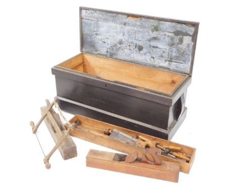 A Victorian painted pine tool chest and contents, the contents of tools comprising saws, screwdrivers, wood planes from a sim