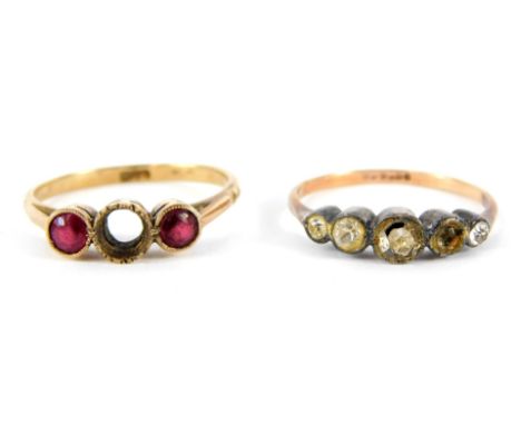 Two dress rings, a 9ct gold three stone set dress ring, set with garnets, central stone missing, and a 9ct gold and silver pa