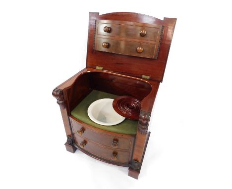 A Victorian mahogany bow front commode, the hinged top opening to reveal a seat with pottery bowl and turned covered lid, wit