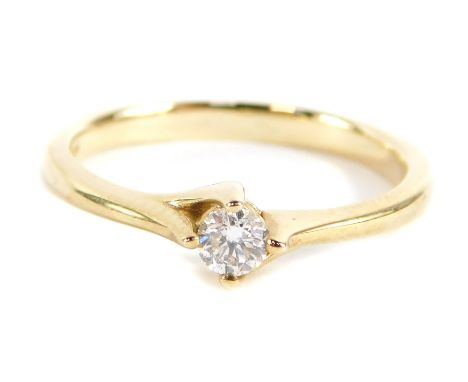 A 9ct gold diamond solitaire ring, with round brilliant cut diamond approx 0.15cts, in four claw twist setting, ring size N, 