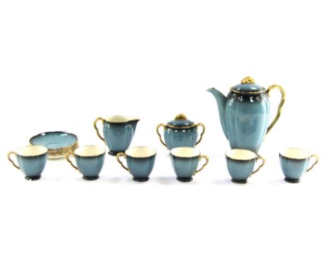 A Carlton ware Bleu Royale coffee service, comprising coffee pot, cream jug, sucrier, six cups and saucers. 