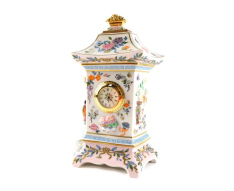 A Franklin Mint Clock of One Hundred Flowers mantel clock, designed by Dawen Wang, with floral design top and gilt knop, 21cm