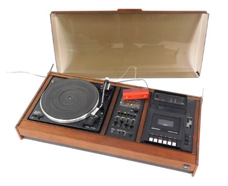 A Garrard SP 25MKV belt turntable and amplifier system, in fitted case. 