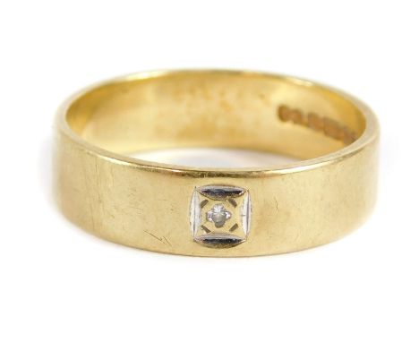 A 9ct gold wedding band, set with tiny diamond in white gold square setting, London 1986, ring size M½, 3g all in.   