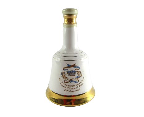 A Bells Scotch whisky decanter, to commemorate the birth of Prince William Of Wales, 21st June 1982, 21cm high. 