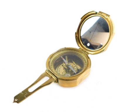 A Stanley London brass nautical compass, with Natural Sine table to the outer casing. 