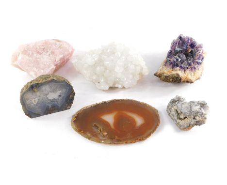A group of semi precious stones, to include an amethyst, geode, a rose quartz section and other geodes.  (1 box)  Note: VAT i