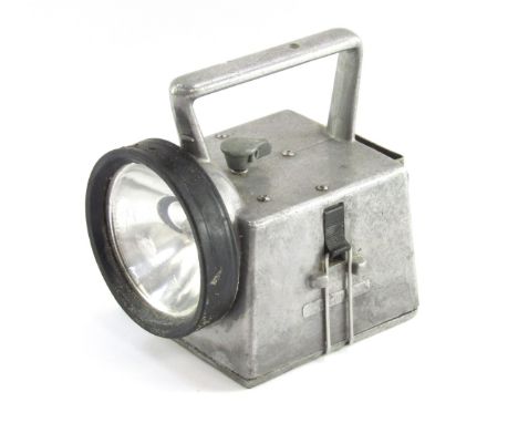 A 1960's steel cased inspection lamp, 15cm high. 