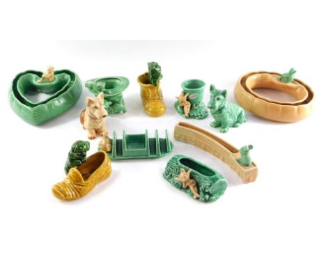 A group of Sylvac pottery, green and light brown, to include dogs and pixies, planters and a toast rack. (a quantity) 