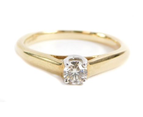 A 9ct gold diamond solitaire ring, with round brilliant cut diamond approx 0.25cts, in four claw raised basket setting with V