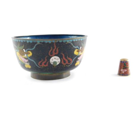 A Chinese cloisonne enamel bowl, decorated with Imperial dragons chasing a flaming pearl, 11cm diameter, together with a cloi