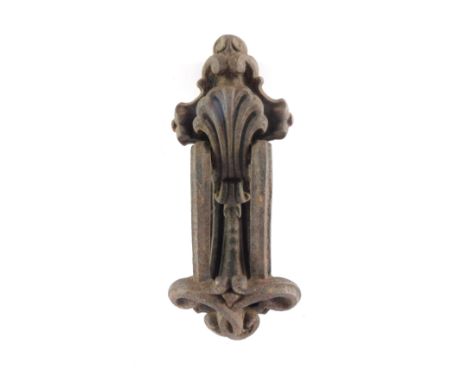 A Victorian cast iron door knocker, 22cm high. 