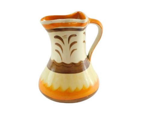 A Myott Son &amp; Co 1930's painted jug, on a cream ground with orange and brown painted detailing, 20cm high. 