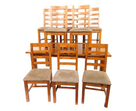 A pine plank top rectangular extending dining table, raised on square stile supports, 77.5cm high, 182cm wide, 142cm extended