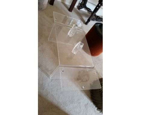 Perspex clear coffee table 120 cm long, 49cm deep, 38 cm high (transparent supports on surface indicate this is missing its t